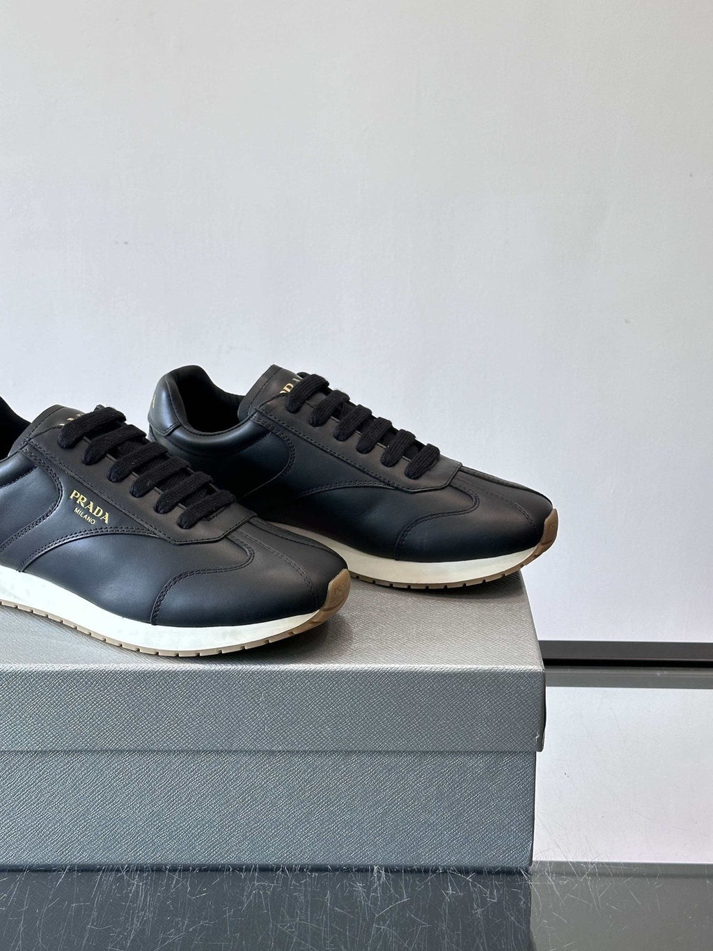 Prada Men's Black Low-Top Sneakers - Black Upper With White And Tan Accents